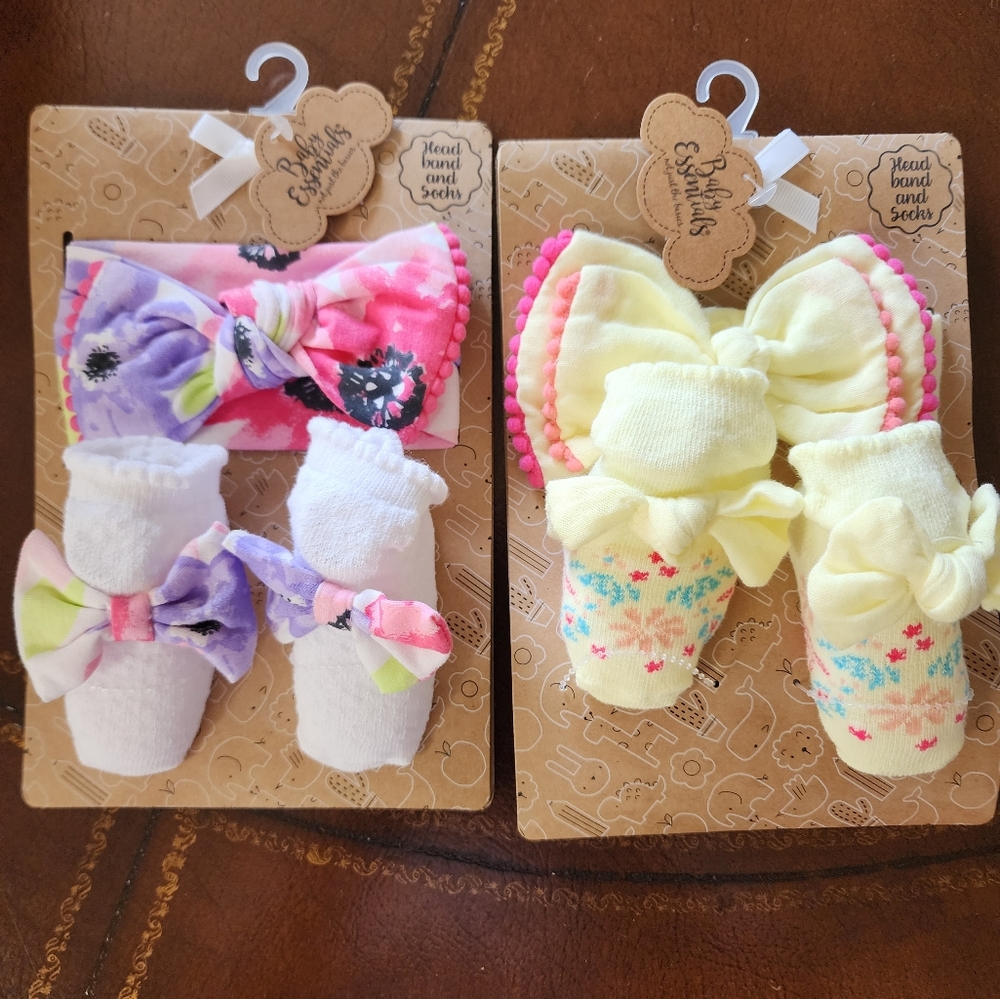 Unopened baby socks and bow
